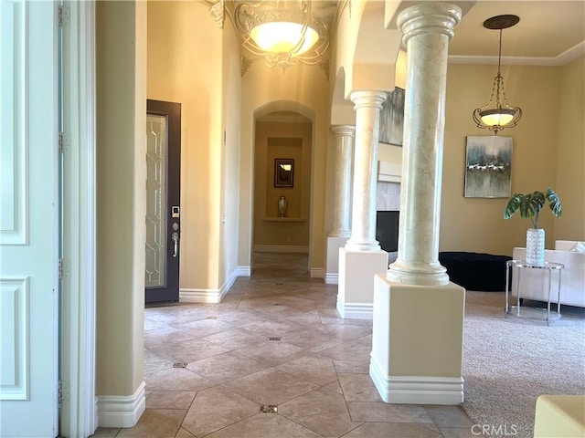 4069 Nancy Cir, Corona, CA 92881 - corridor featuring ornate columns, arched walkways, and baseboards