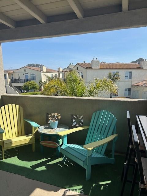 balcony featuring a residential view