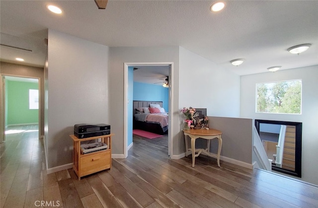 11102 Avolencia Pl, Garden Grove, CA 92840 - hall with wood finished floors, an upstairs landing, baseboards, and recessed lighting