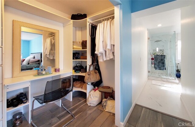 11102 Avolencia Pl, Garden Grove, CA 92840 - spacious closet with wood finished floors and built in study area