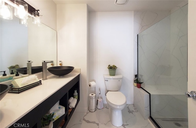 11102 Avolencia Pl, Garden Grove, CA 92840 - full bathroom featuring marble look tile flooring, double vanity, a marble finish shower, and toilet