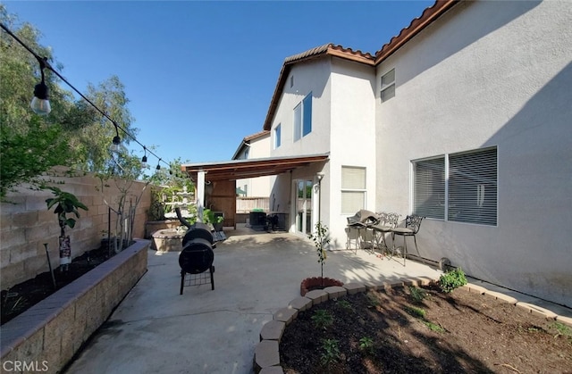 11102 Avolencia Pl, Garden Grove, CA 92840 - fenced backyard featuring a patio area and an outdoor fire pit