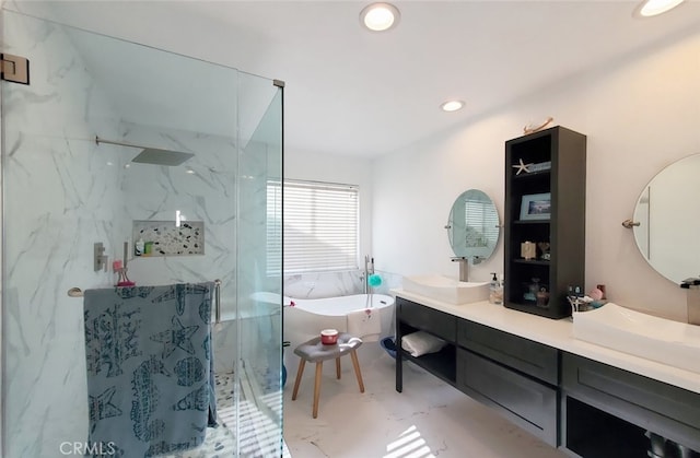 11102 Avolencia Pl, Garden Grove, CA 92840 - bathroom featuring double vanity, a freestanding bath, a marble finish shower, and recessed lighting