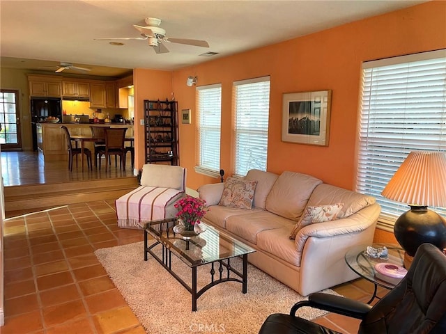 7371 Mcclure Ave, Gerber, CA 96035 - living room featuring a ceiling fan and light tile patterned floors