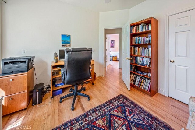home office featuring wood finished floors
