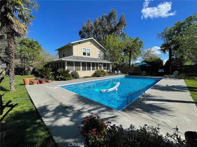7371 Mcclure Ave, Gerber, CA 96035 - view of swimming pool with a sunroom, a fenced backyard, and a patio area