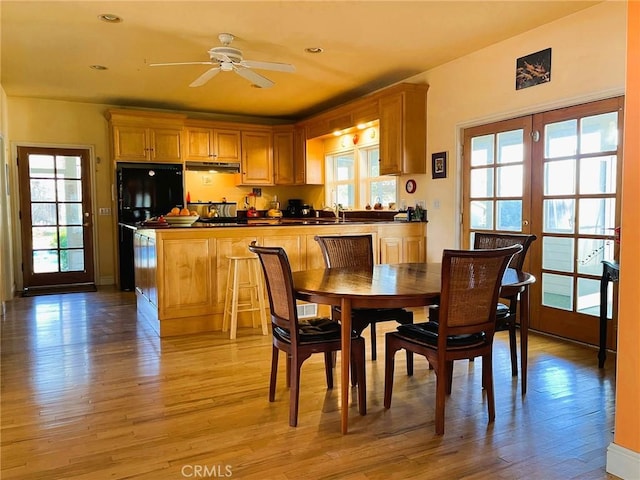 dining area featuring recessed lighting, a ceiling fan, french doors, and light wood-type flooring
