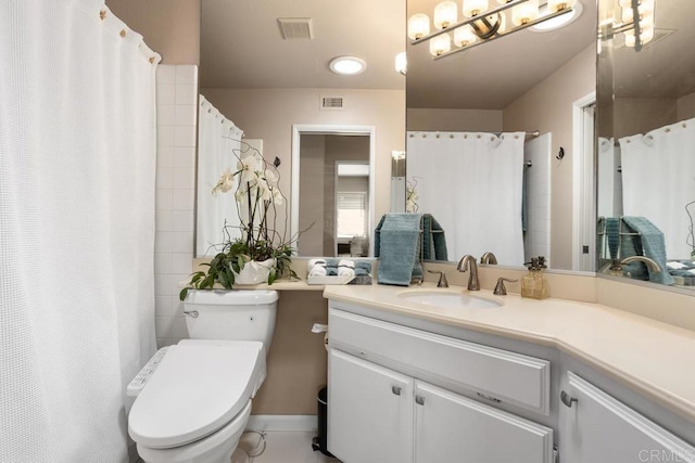 full bath featuring toilet, vanity, a chandelier, and curtained shower