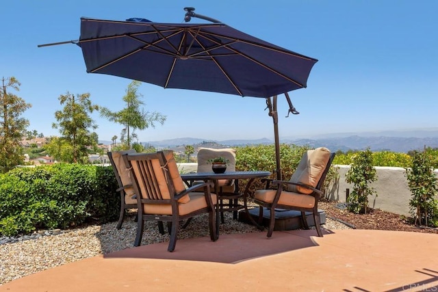 13336 Corte De Comares, San Diego, CA 92128 - view of patio featuring outdoor dining area and a mountain view