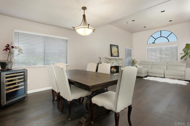 13336 Corte De Comares, San Diego, CA 92128 - dining space featuring wine cooler, dark wood-type flooring, and recessed lighting