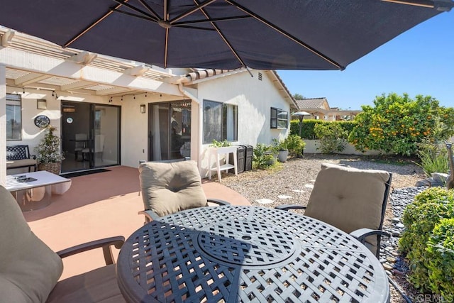 13336 Corte De Comares, San Diego, CA 92128 - view of patio featuring a pergola and outdoor dining space