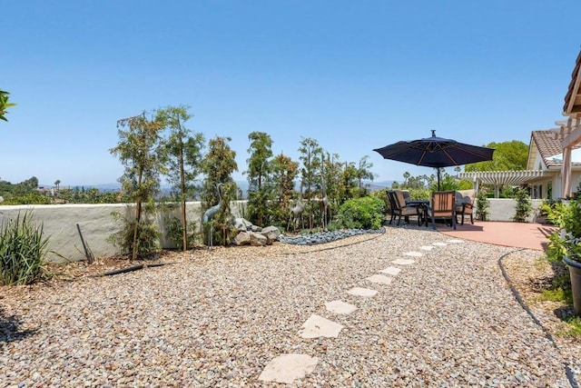 13336 Corte De Comares, San Diego, CA 92128 - view of yard featuring a pergola and a patio area