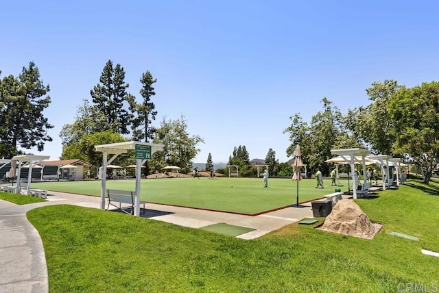 13336 Corte De Comares, San Diego, CA 92128 - view of property's community with a bocce ball area, a pergola, and a yard