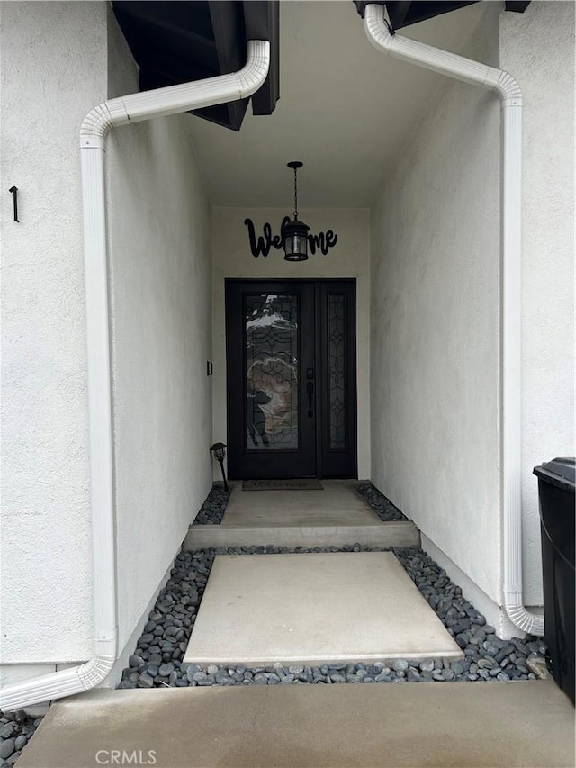 2821 Carnoustie, Ontario, CA 91761 - view of exterior entry featuring stucco siding