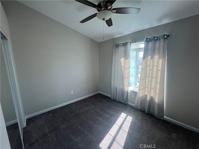 17238 Danbury Ave, Hesperia, CA 92345 - unfurnished bedroom featuring baseboards, ceiling fan, and dark carpet