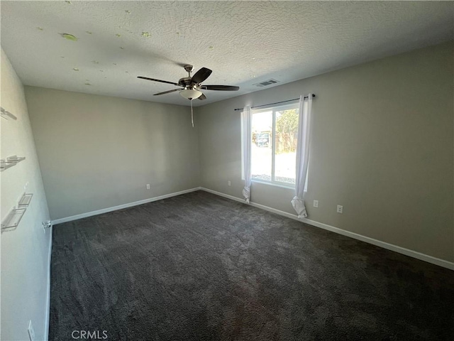 17238 Danbury Ave, Hesperia, CA 92345 - spare room featuring a textured ceiling, visible vents, baseboards, ceiling fan, and dark carpet