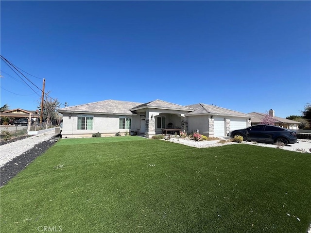 17238 Danbury Ave, Hesperia, CA 92345 - view of front facade featuring stucco siding, a garage, and a front lawn