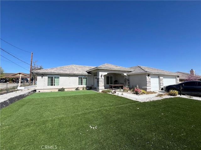 17238 Danbury Ave, Hesperia, CA 92345 - view of front of property with stucco siding, an attached garage, and a front lawn