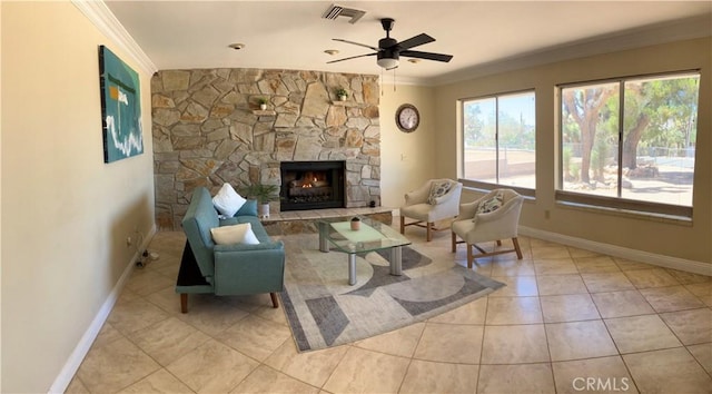 56707 Desert Gold Dr, Yucca Valley, CA 92284 - living room with a ceiling fan, crown molding, a fireplace, and tile patterned flooring