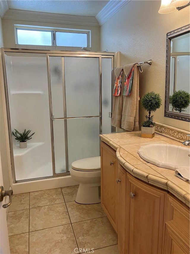 56707 Desert Gold Dr, Yucca Valley, CA 92284 - bathroom with ornamental molding, vanity, a shower stall, and tile patterned floors