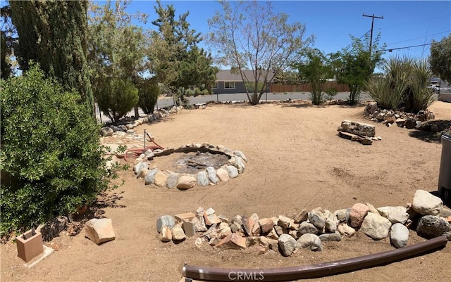 56707 Desert Gold Dr, Yucca Valley, CA 92284 - view of yard with a fire pit