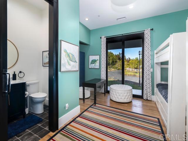 2255 Via Dulcea, Fallbrook, CA 92028 - bathroom featuring vanity, recessed lighting, and wood finished floors