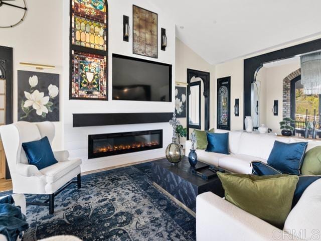 2255 Via Dulcea, Fallbrook, CA 92028 - living area featuring a glass covered fireplace and vaulted ceiling