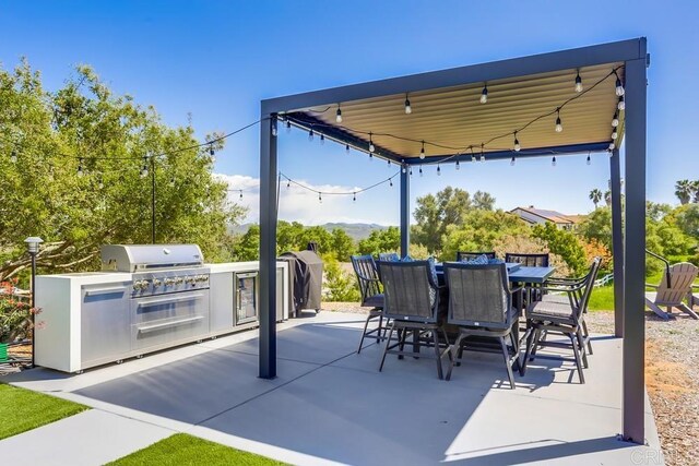 2255 Via Dulcea, Fallbrook, CA 92028 - view of patio / terrace with exterior kitchen and outdoor dining area