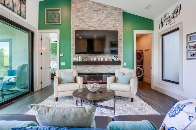 2255 Via Dulcea, Fallbrook, CA 92028 - living room with lofted ceiling, estacked washer and dryer, wood finished floors, and plenty of natural light