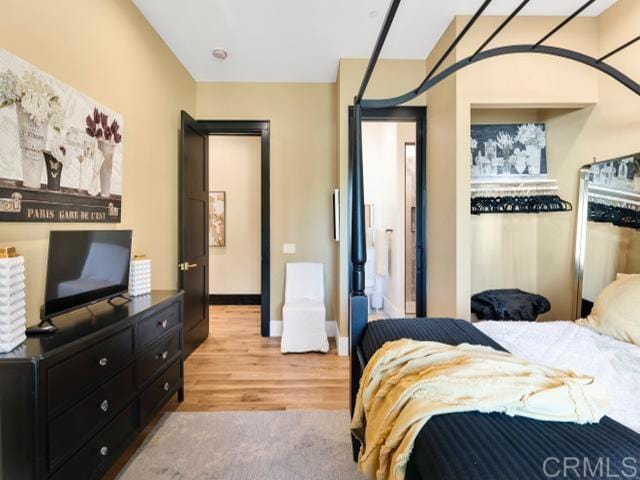 2255 Via Dulcea, Fallbrook, CA 92028 - bedroom with light wood-style flooring and baseboards
