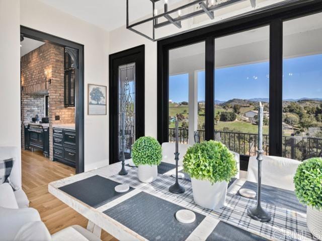 2255 Via Dulcea, Fallbrook, CA 92028 - dining room with wood finished floors and a mountain view