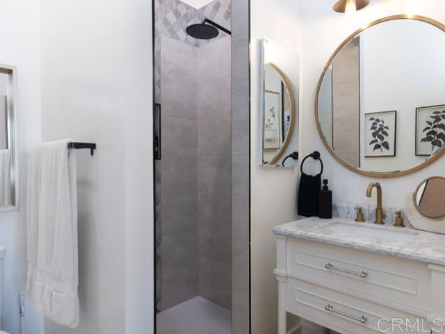 2255 Via Dulcea, Fallbrook, CA 92028 - full bathroom featuring tiled shower and vanity