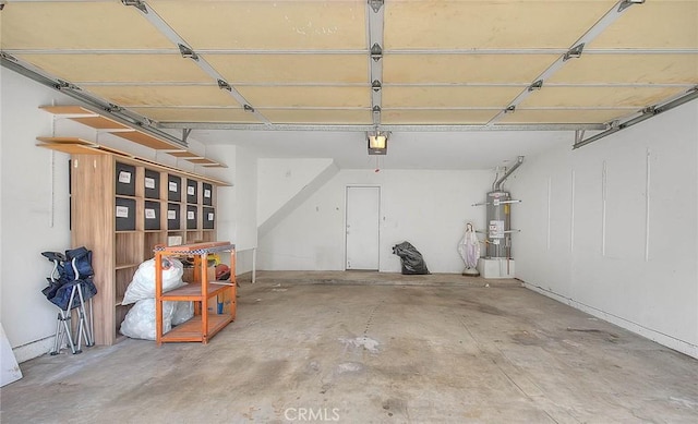 garage with strapped water heater and a garage door opener