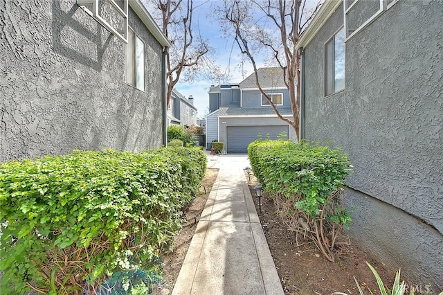 view of property exterior with stucco siding
