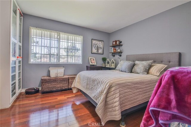 13720 Woodcock Ave, Sylmar, CA 91342 - bedroom featuring hardwood / wood-style flooring