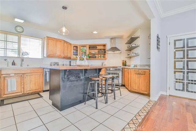 13720 Woodcock Ave, Sylmar, CA 91342 - kitchen with open shelves, wall chimney exhaust hood, light countertops, a breakfast bar, and ornamental molding