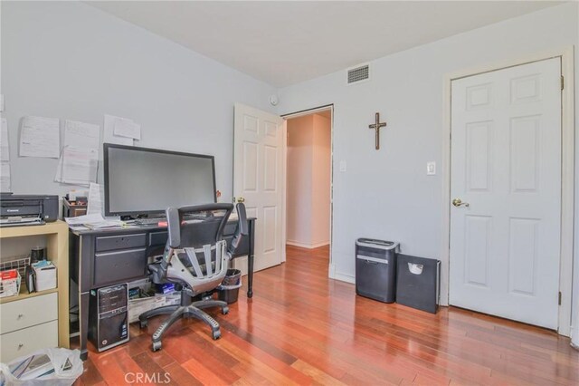 13720 Woodcock Ave, Sylmar, CA 91342 - home office with wood finished floors