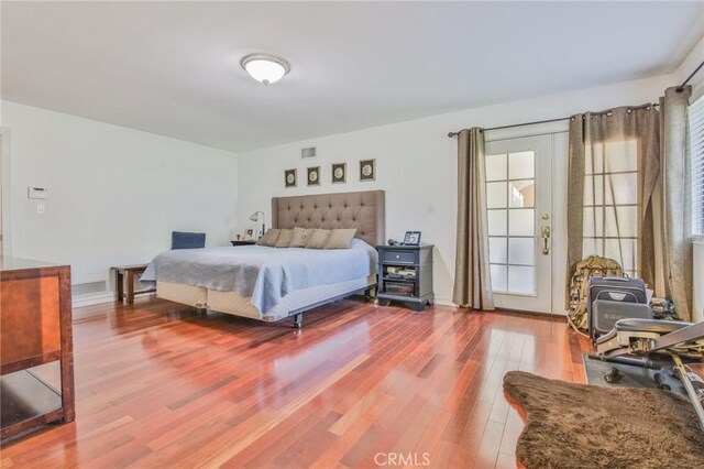 13720 Woodcock Ave, Sylmar, CA 91342 - bedroom with wood finished floors