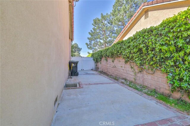 13720 Woodcock Ave, Sylmar, CA 91342 - view of patio with a fenced backyard