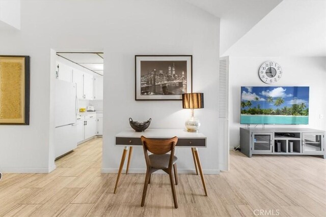 1692 Fairway Cir, Palm Springs, CA 92264 - dining area with light wood-style flooring and baseboards