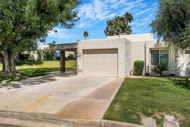 1692 Fairway Cir, Palm Springs, CA 92264 - adobe home featuring concrete driveway, a carport, an attached garage, a front yard, and stucco siding