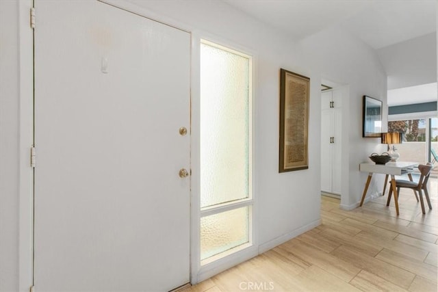 1692 Fairway Cir, Palm Springs, CA 92264 - corridor with baseboards and light wood finished floors