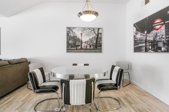 1692 Fairway Cir, Palm Springs, CA 92264 - dining area featuring wood finished floors, visible vents, and baseboards