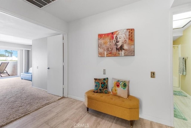 1692 Fairway Cir, Palm Springs, CA 92264 - corridor with baseboards, wood finished floors, and visible vents
