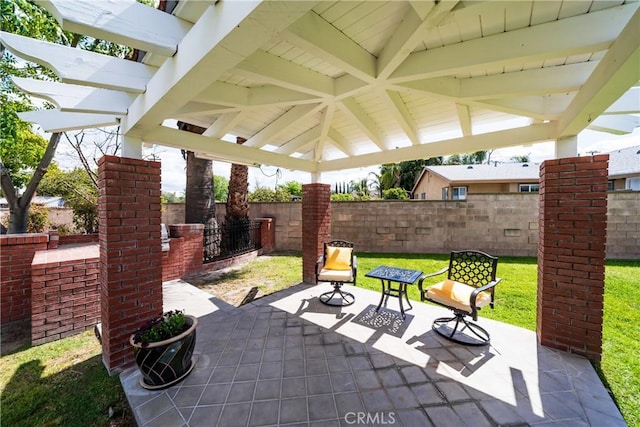 view of patio featuring a gazebo, fence, and a pergola