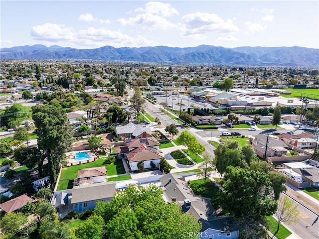 drone / aerial view featuring a mountain view and a residential view