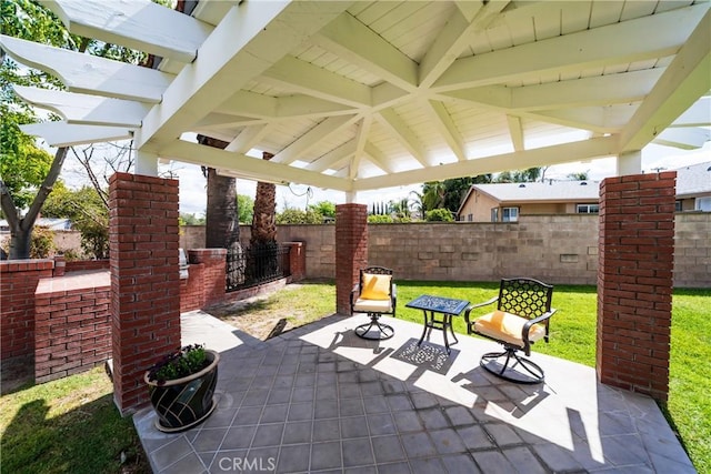 view of patio / terrace featuring a gazebo, a pergola, and fence