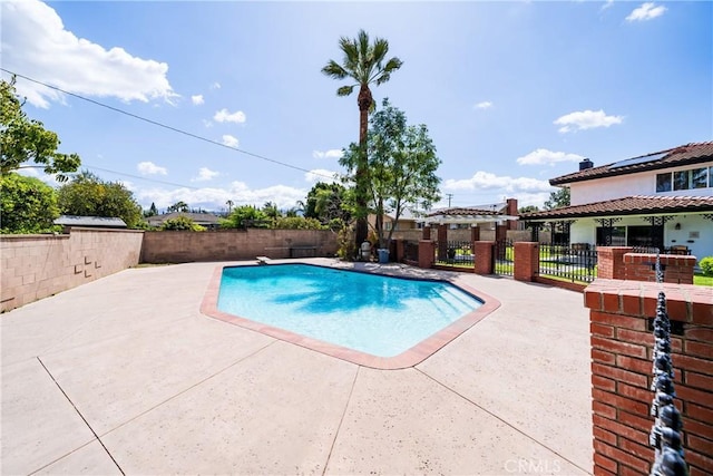view of pool featuring a fenced in pool, a patio, and fence
