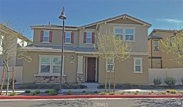 17062 Zion Dr, Canyon Country, CA 91387 - view of front of home with stucco siding and solar panels