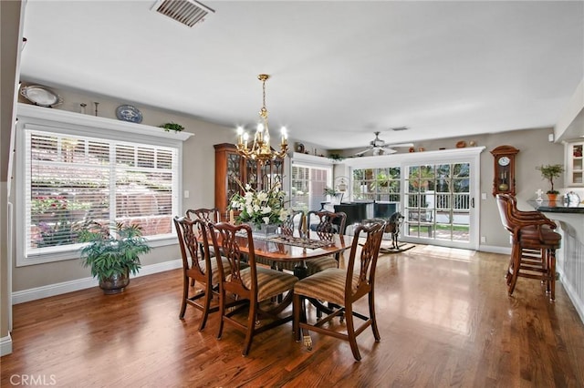 1803 La Cima, San Clemente, CA 92672 - dining room with healthy amount of natural light, baseboards, wood finished floors, and a chandelier